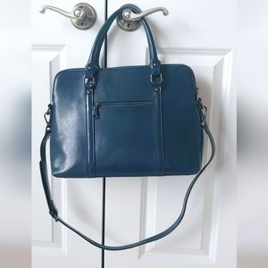 Genuine Leather briefcase. 11.5" tall x 14.5" wide.